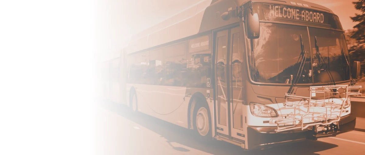 new flyer city bus orange hue gradient into white